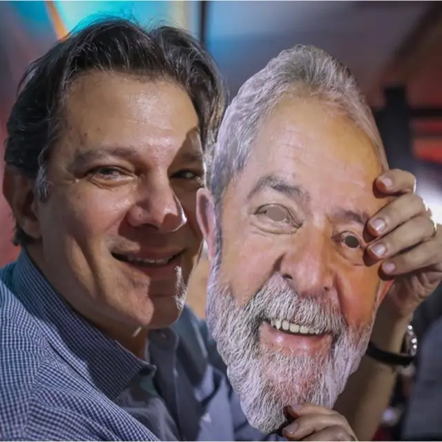 Haddad com máscaraestrela bet estrelaLula