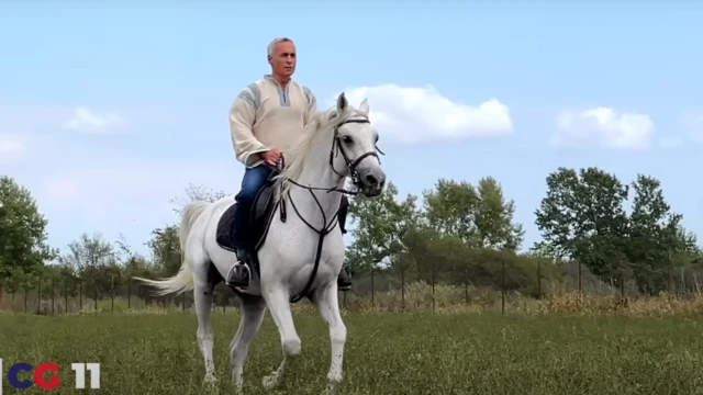 Кэлин Джорджеску верхом на лошади