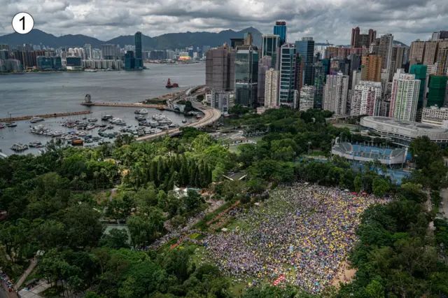 This sweeping panorama of Hong Kong, overlooking Victoria park, shows hundreds if not thousands of people staged for the march in the morning or early afternoon.