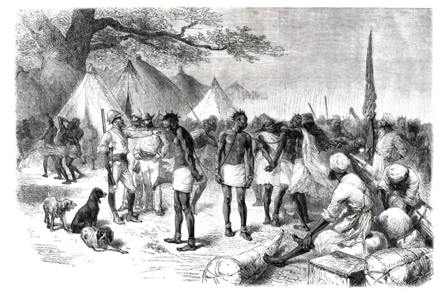 Des colons britanniques faisant le commerce d'esclaves en Afrique de l'Ouest, 1877. Édition originale issue de mes propres archives.