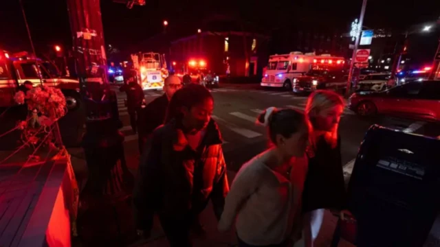 Authorities dey lead students away from campus after shooting for Brown University.