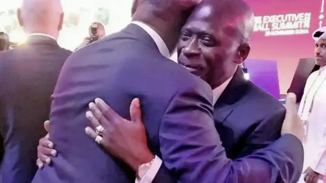 Fegafoot chief Pierre-Alain Mounguengui dey hug Caf president Patrice Motsepe