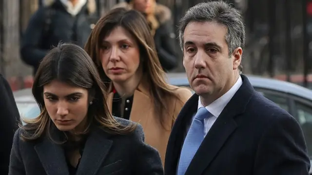 Michael Cohen, President Donald Trump's former personal attorney and fixer, arrives with daughter Samantha Blake Cohen and wife Laura Shusterman at federal court for his sentencing hearing on December 12, 2018 in New York City. Cohen is set to be sentenced by a federal judge after pleading guilty to several charges, including multiple counts of tax evasion, a campaign finance violation and lying to Congress