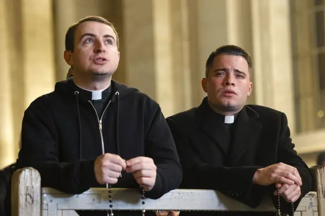Priests attend one rosary prayer for Pope Francis for St. Peter's Square for Vatican, on 24 February 2025.