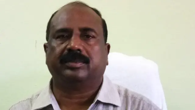 అధికారి