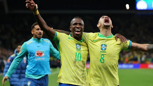 Vinicius Jr and Bruno Guimaraes celebrate for Brazil