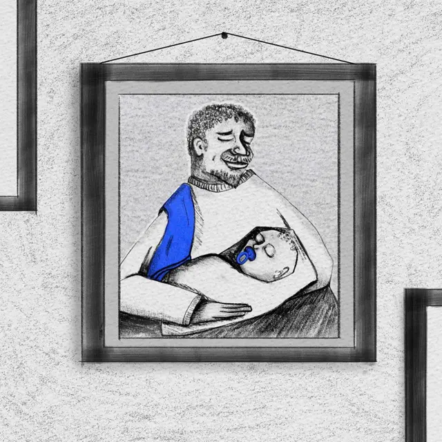 ልጁን ያቀፈ አባት ምስል