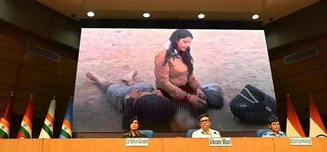 পহেলগামে নিহত নৌসেনার স্ত্রী হিমাংশী নারওয়ালকেও এর আগে ট্রোলিংয়ের নিশানা করা হয়েছে। এখানে তার ছবিই দিল্লিতে সরকারের ব্রিফিংয়ে দেখানো হচ্ছে