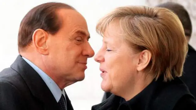 Berlusconi and Angela Merkel
