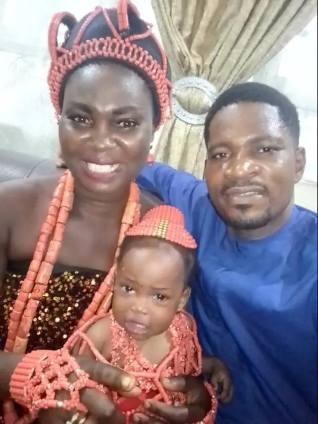 Mr Segun Oihara toged wit im wife and daughter, Hephziba