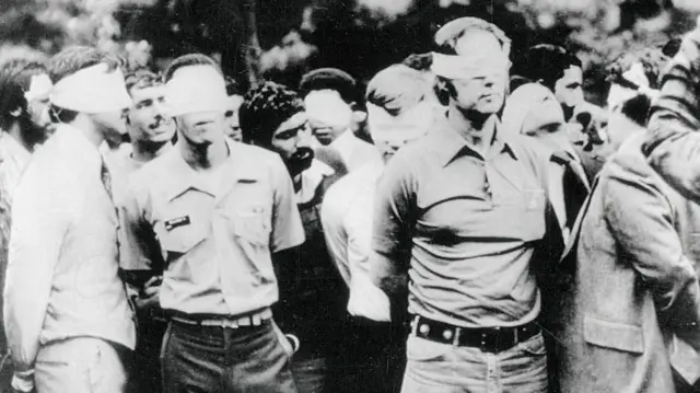 ઈરાનમાં હિંસા, અમેરિકાના ડોનાલ્ડ ટ્રમ્પની ધમકી, આયાતુલ્લાહ ખોમેનેઈ અને ટ્રમ્પ, તેહરાન બંધક સંકટ, જીમા કાર્ટર, રોનાલ્ડ રિગન ખોમેનેઈ તથા અમેરિકાના સંબંધ, ઈરાન અમેરિકા સંબંધ, બીબીસી ગુજરાતી ઇન્ટરનેશનલ ન્યૂઝ આંતરરાષ્ટ્રીય સમાચાર, 