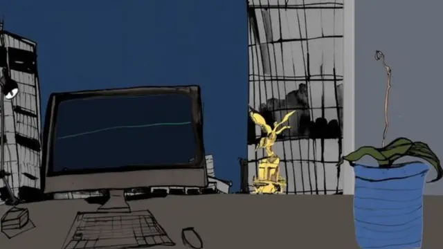 Computador ao lado de flores mortas