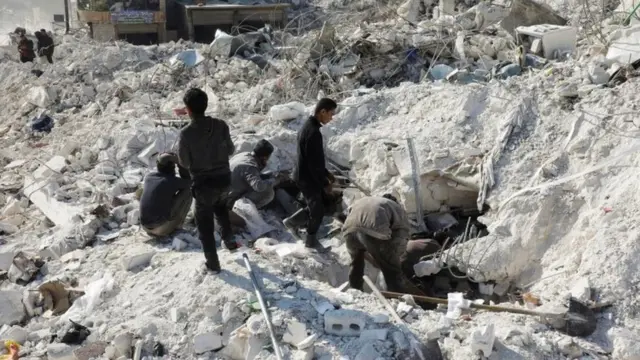People search through the rubble in the rebel-held town of Harem, north-western Syria. Photo: 13 February 2023