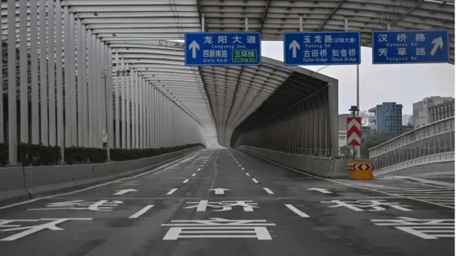 An empty road is seen in Wuhan in China"s central Hubei province on January 27, 2020,