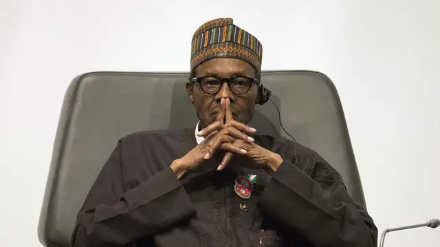 Former president Muhammadu Buhari, for di peace forum, by Senegal in 2016.