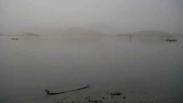 Yellow dust from the deserts of China and Mongolia blanket a lake in Seoul, South Korea