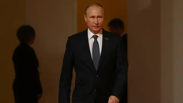 путін