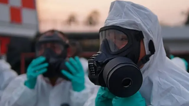 Royal Thai Navy taken and released on Feburary 4, 2020 shows navy officials preparing for the arrival of a plane carrying Thai nationals who had been evacuated from Wuhan, the epicentre of the novel coronavirus outbreak, at U-Tapao Airport