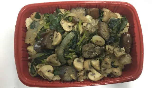 Cous cous with spinach, mushroom and egg plant stir fry