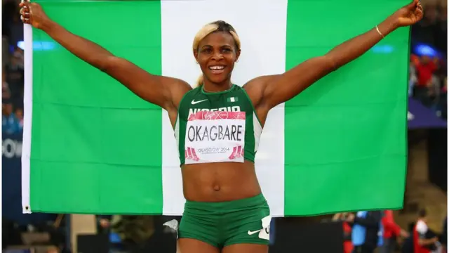 Blessing Okagbare as she carry Nigerian flag dey celebrate