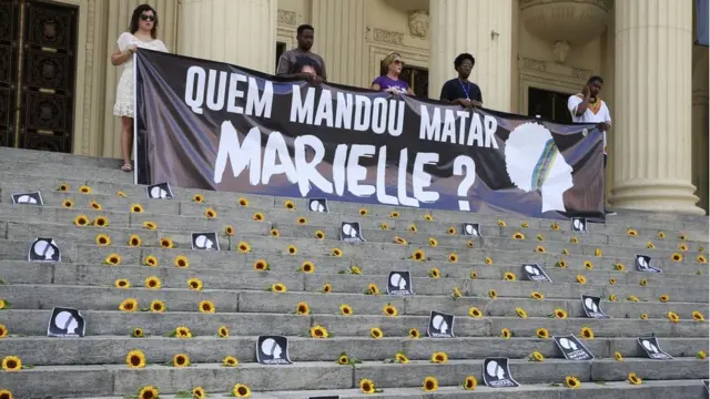 Ato Amanhecer por Marielle e Anderson na escadaria da Assembleia Legislativa do Rioaposta real madrid x liverpoolJaneiro (Alerj) marca um ano da morte da vereadora Marielle Franco e seu motorista Anderson Gomes