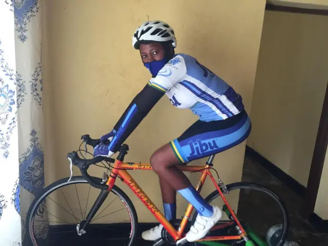 Divine Tumukunde ari mu kigo aho batuye banakorera imyitozo