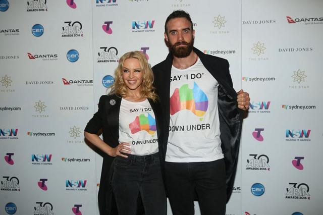 Kylie Minogue and Joshua Sasse pose in the ARIA awards room during the 30th Annual ARIA Awards 2016 at The Star on 23 November 2016 in Sydney, Australia.