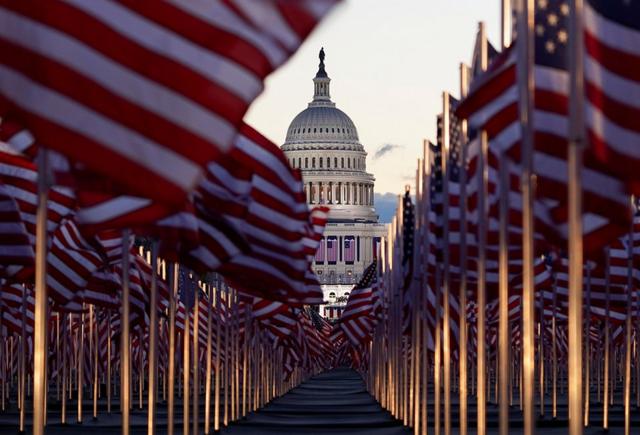 The "Field of flags" is seen on the National Mall in front of the U.S. Capitol building ahead of inauguration ceremonies for President-elect Joe Biden in Washington DC. 20 January 20, 2021.