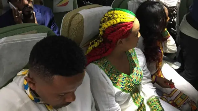 ተጓዦች አውሮፕላን ውስጥ