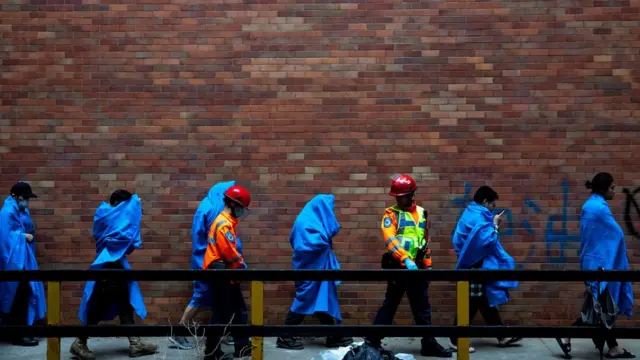 Protesters are seen after leaving the campus of the Hong Kong Polytechnic University (PolyU), in Hong Kong, China November 19, 2019