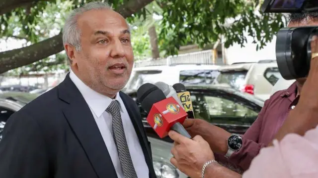 ஹக்கீம்.