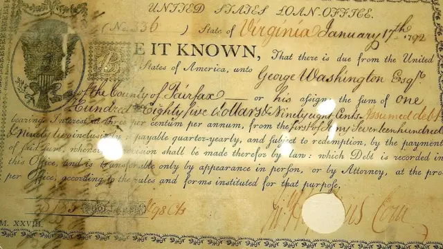Эта старинная облигация подписана в 1792 году тогдашним президентом США Джорджем Вашингтоном. На ней впервые в американском финансовом документе используется значок доллара