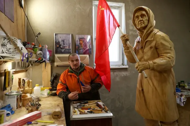 grandmother with red flag