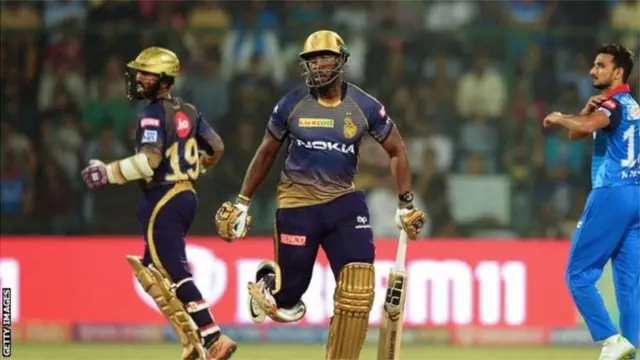 दिनेश कार्तिक-आंद्रे रसेल