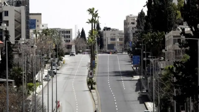 The streets of Amman were deserted as the curfew was announced on Monday