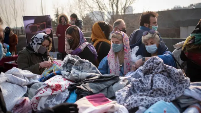 Women shopping at a bazaar in Iran