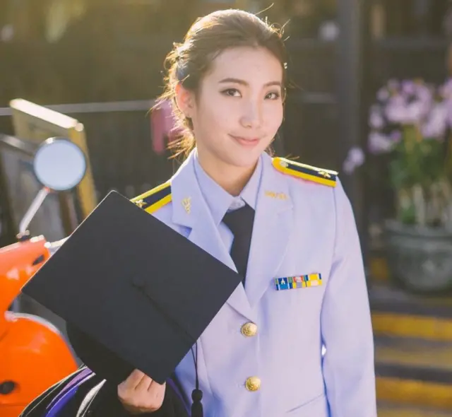 Kanpassorn graduates with a dentistry degree