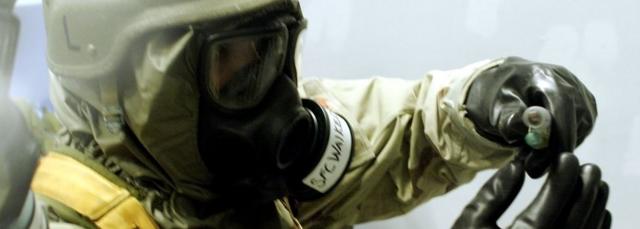 US military personnel conduct drills of chemical weapons handling