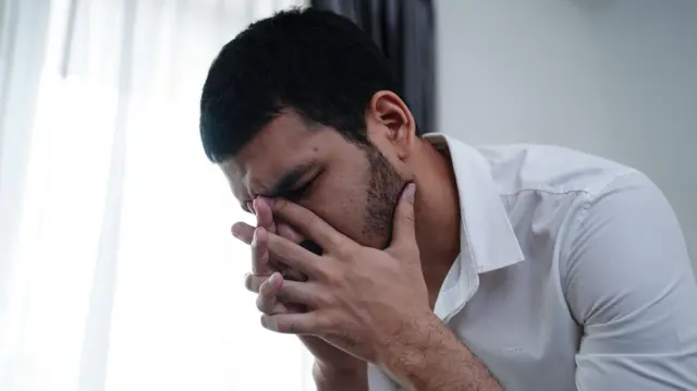 Man having a sudden illness.