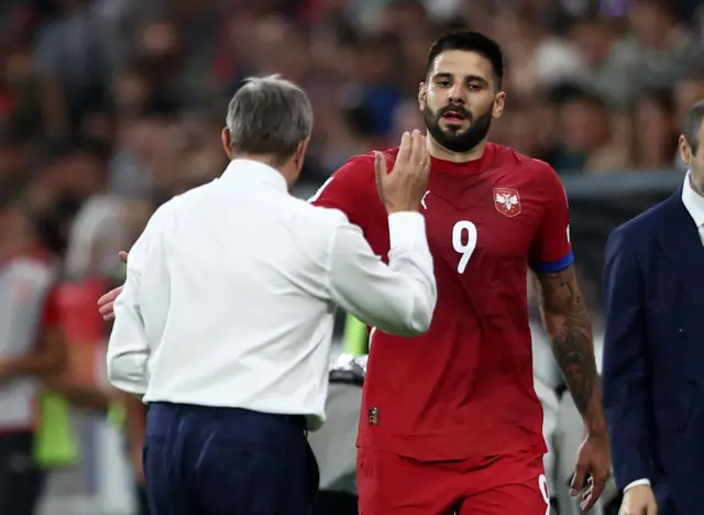 драган стојковић пикси и александар митровић се поздрављају