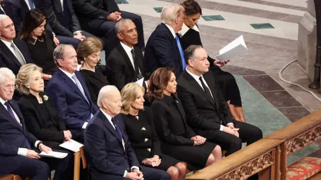 From left to right, front row, US President Joe Biden, First Lady Lady Jill Biden, Vice President Kamla Harris, Second Gentleman Doug Emhoff, second row, former President Bill Clinton, former Secretary of State Hillary Clinton, former President George W. Bush, his wife Laura Bush, former President Barack Obama, President-elect Donald Trump and his wife Melania Trump attend the State Funeral Service for former US President Jimmy Carter