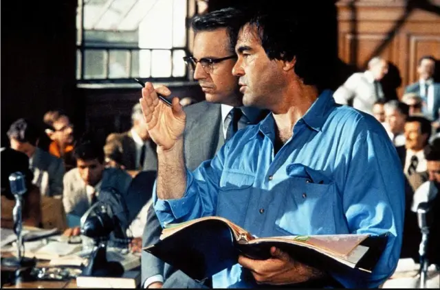 Firime JFK ya Oliver Stone, iri mu vyatumye inzandiko z'ibanga kuri iri gandagurwa rya J. F. Kennedy zishirwa ahabona