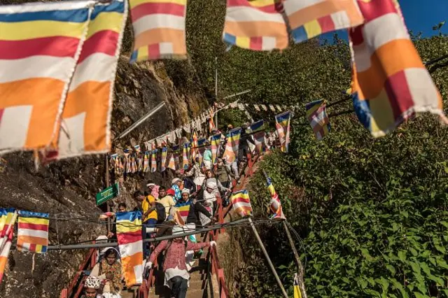 A bulb-light path and general view of the Adam's Peak mountain in Hatton, Sri Lanka, on April 22, 2023