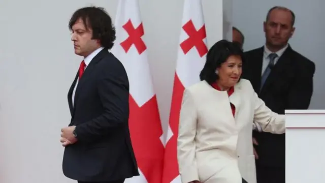 An image of Georgian PM Irakli Kobakhidze and president Salome Zurabishvili during a rally.