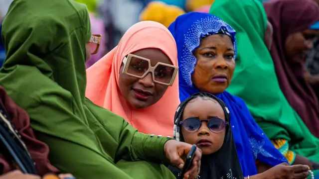 Women show for Eid prayer ground