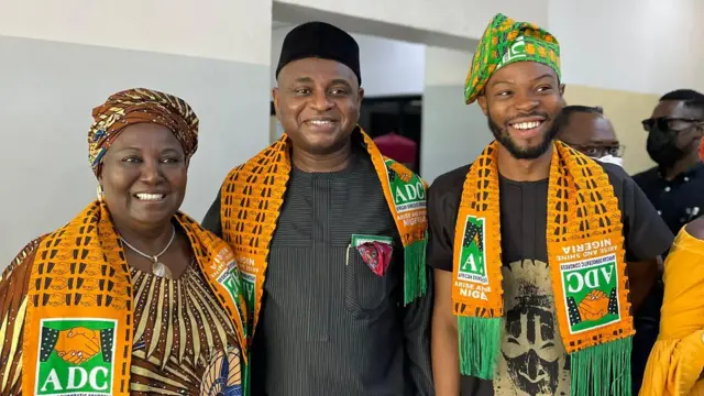 Kingsley Moghalu (centre) a former deputy governor of the Central Bank of Nigeria, flanked by supporters as an aspirant for the presidential ticket of the ADC prior to the 2023 general elections 