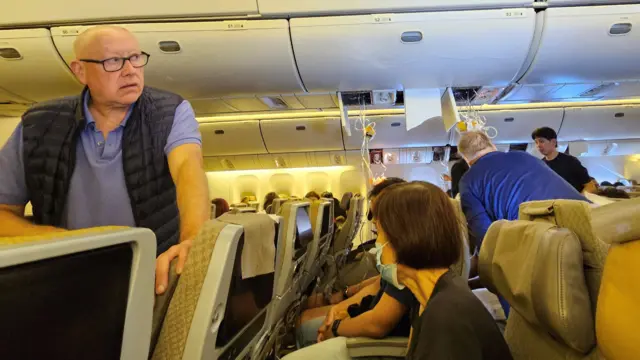 Pasajeros en el vuelo de Singapore Airlines