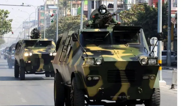 Armoured personnel carriers are seen on the streets of Mandalay on February 3, 2021.