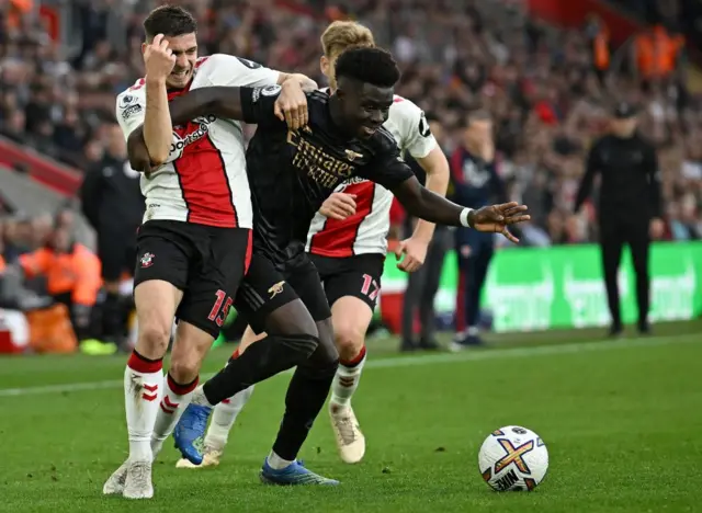 Southampton and Arsenal players during dia game