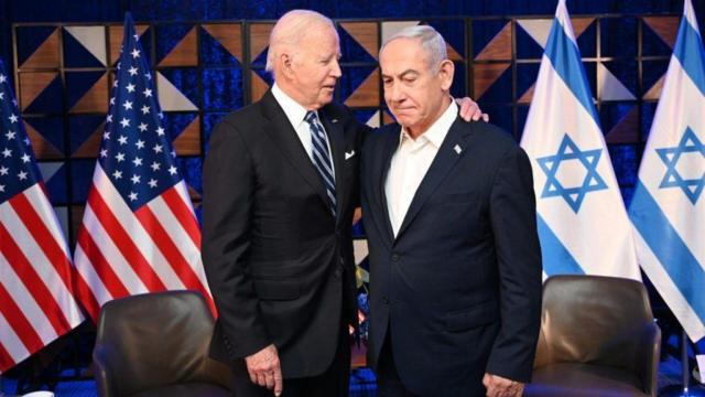 File image of US President Biden with his arm around Israeli Prime Minister Benjamin Netanyahu's shoulder